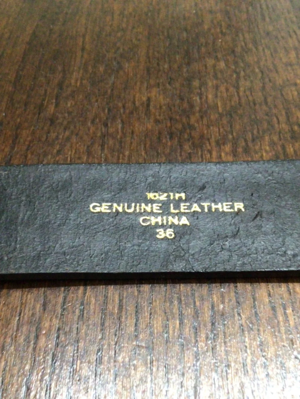 Genuine leather western belt with Silvertone buckle. Size 36.